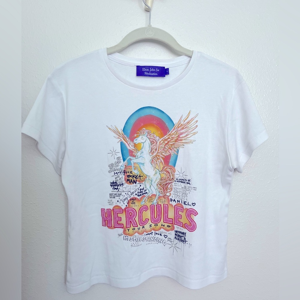 *Authentic* Realisation Par Hercules Elton John baby tee